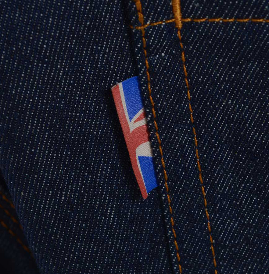 Meccanica raw denim blue straight leg jeans Union Jack tag detail