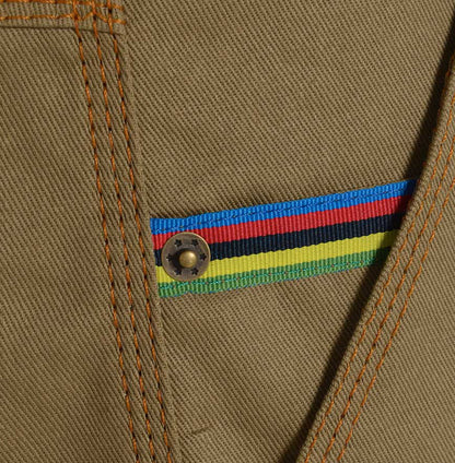 Brass studs on British made beige narrow leg chino jeans - triple stitched