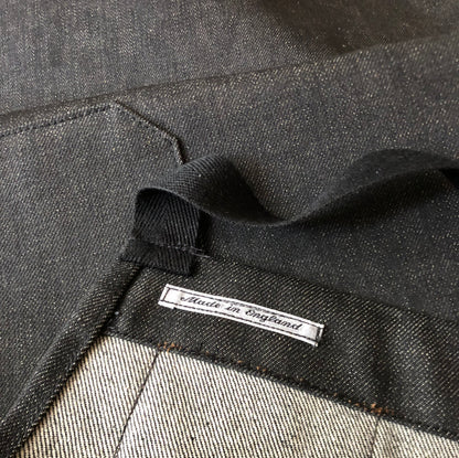 selvedge denim apron leather strap made in england label