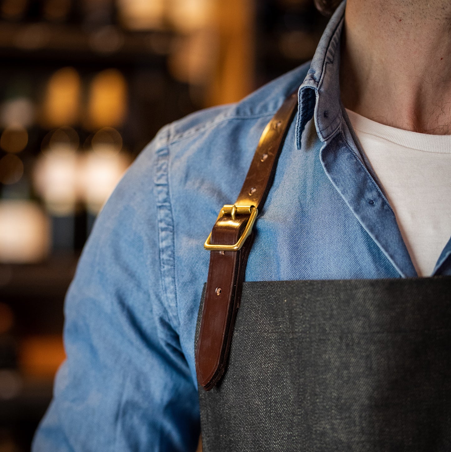 selvedge denim apron leather strap detail